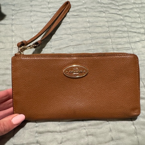Coach Handbags - Coach Brown Leather Wristlet Clutch with Gold Logo